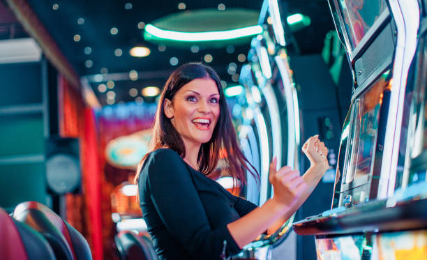 Mobile phone displaying nikmat777 slot live casino interface with roulette wheel